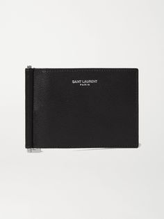 SAINT LAURENT's billfold wallet is crafted from high-grade leather with a pebble finish, so it's durable enough to stand up to scuffs and marks. It opens to reveal a total of six cards slots, and comes with a silver money clip to keep notes secure. Luxury Wallets With Grained Texture For Formal Occasions, Classic Formal Wallets With Pebbled Texture, Classic Formal Wallet With Pebbled Texture, Luxury Leather Wallet With Grained Texture, Formal Leather Wallet With Grained Texture, Classic Pebbled Texture Formal Wallets, Keep Notes, Saint Laurent Collection, Wallet With Money