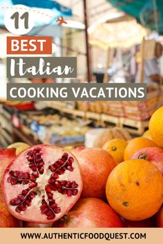 some oranges and pomegranate on display in a market with text overlay that reads best italian cooking vacation