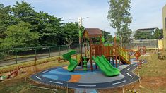 a children's play area in the middle of a park