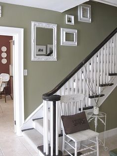 the stairs in this house are decorated with white frames