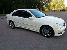 a white car parked in a parking lot