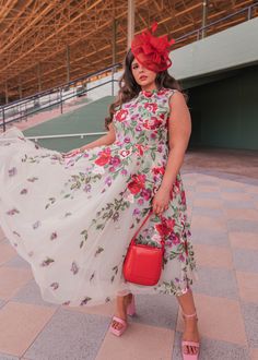 Garden Party Goddess Inspired by the grand tradition of the Derby races, this alluring masterpiece is destined to command the gaze of every eye you meet. This sleeveless A-line silhouette denotes a timeless grace and poise. Adorned in shades of red and green, this rose design ensures its wearer shines with the luster of the season's boldest bloom. This garden party favorite emulates a joyful beauty, sweetly suited for the lady who intends to make a statement of a splendid, vibrant life. Halter neckline Sleeveless Fitted waistline Fully lined Back zipper Model Details Content + Care 100% Polyester Hand Wash Only Hang Dry Try-On Video Georgina Dress Try-On Video XS & XL Derby Dress, Jewel Neckline, Halter Neckline, Rose Design, Shades Of Red, Plus Size Dress, Try On, Garden Party, Design Crafts