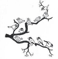 several birds are sitting on the branches of a tree