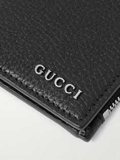 Gucci's billfold wallet has space for your cards, notes, and coins. It's crafted from full-grain leather that'll stand up nicely to daily use and is embellished with the brand's sleek silver-tone logo. Luxury Leather Card Holder With Coin Pocket, Gucci Rectangular Wallet With Rfid Blocking, Gucci Luxury Wallets With Rfid Blocking, Designer Gucci Wallet With Rfid Blocking, Gucci Luxury Wallet With Rfid Blocking, Luxury Gucci Wallet With Rfid Blocking, Gucci Leather Wallets With Rfid Blocking, Gucci Leather Wallet With Rfid Blocking, Gucci Bifold Wallet For Everyday Use