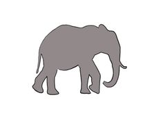 an elephant standing on top of a white surface