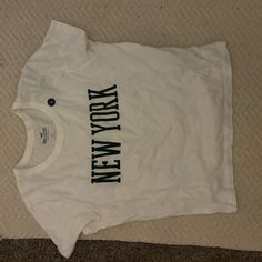 Cropped Baby Tee That’s Never Been Worn Because It Was The Wrong Size Fitted White Crop Top With Funny Print, White Fitted Cropped Graphic Tee, White Cropped T-shirt With Funny Print, White Cropped Slogan T-shirt, White Cropped T-shirt With Text Print, White Crop, Hollister Tops, Hollister, Infant Tees