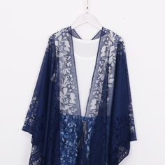 Welcome to my shop, I am in China. It will need around 30 days for international orders. Please consider the time when placing order. Long bohemian kimono,perfect for a casual day out or as a swimsuit cover up. Material: polyester soft fabric One size fit all: Width: 47 inches (120cm) Side length: 46 inches (117cm) Back length:36 inches (92 cm) CARE: Wash gently by hand in cold water. Single wash. Don't press! Hang to dry. Maybe you will like other items in my shop, find them here: https://www.e One Size Bohemian Blue Cover-up, Bohemian Blue One-size Cover-up, Bohemian Beach Kimono With Shawl Shape, Bohemian Kimono Shawl For Beach, Bohemian Shawl Kimono For Beach, Summer Bohemian Kimono With Lace Trim, Blue Hippie Kimono For Beach Cover-up, Bohemian Lace Kimono For Festivals, Bohemian Lace Kimono