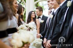 a group of people standing next to each other