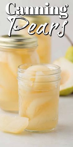 two jars filled with sliced apples and the words canning pears