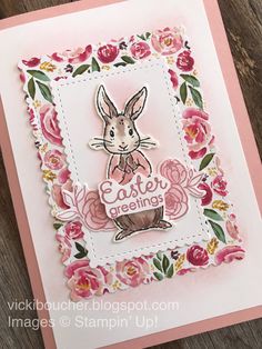 a close up of a card with flowers and a bunny on the inside of it