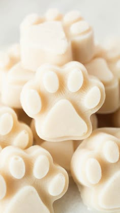 a close up view of white dog paw candies