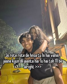 two people hugging each other in front of a yellow car with the caption, do not