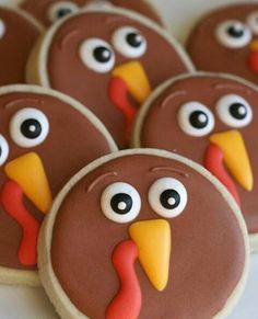 cookies decorated to look like turkeys with googly eyes