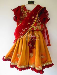 This ethnic lehenga featuring cape sleeve and jerry worked choli and tutu edged skirt accompanied with a sequienced dupatta. Please Visit My Shop For More Unique Collection https://www.etsy.com/shop/Chitralie BUYER'S PLEASE LEAVE YOUR CONTACT NUMBER. It's necessary for shipping. Fabric and Work Choli: Cape sleeve with jerry and sequence embroidered tissue fabric. The choli is lined in soft cotton fabric and ties at the back. The hanging is made with unique fabric flowers. Skirt: Gathered shimmer Maroon Butterfly, Brown Lehenga, Ethnic Lehenga, Maroon Lehenga, Tissue Fabric, Kids Lehenga Choli, Kids Ethnic Wear, Kids Lehenga, Girls Dresses Online