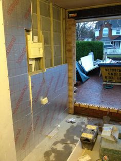 a bathroom being remodeled in the middle of winter with tile on the floor and walls