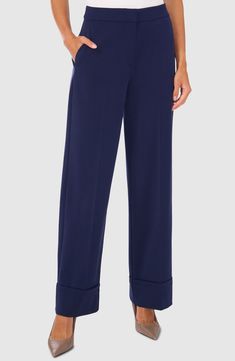 These chic tailored pants are cut with wide legs for a contemporary look, while cuffed hems lend classic polish to the style. 31" inseam; 21 1/2" leg opening; 11 3/4" front rise; 16" back rise Zip fly with hook-and-bar closure Front slant pockets; back welt pockets 68% polyester, 28% rayon, 4% spandex Machine wash, tumble dry Imported Tailored Pants, Wide Legs, Welt Pockets, Leg Pants, Wide Leg Pants, Wide Leg, Navy Blue, Nordstrom, Cuff