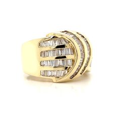 a yellow gold ring with three rows of baguettes set in the center and sides