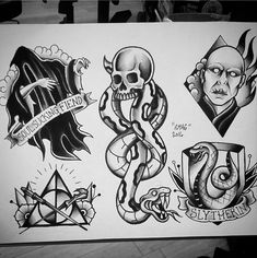 several different tattoos on a piece of paper