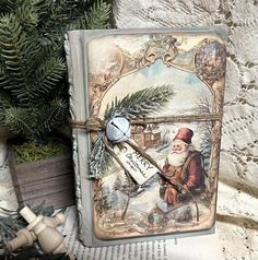 an old fashioned christmas card with a santa clause on it