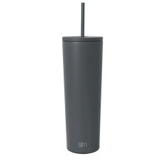 a gray tumbler with a straw in it