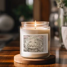 a candle sitting on top of a wooden table