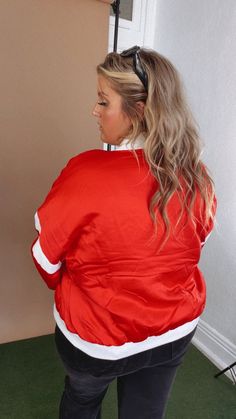 Show them who's boss. The MVP Ohio Varsity Jacket is always one step ahead the ohio varsity jacket featuring a vintage look, collar neckline and long sleeves. Make sure you're prepared to turn heads! Varsity Jacket Ohio varsity jacket Red Ohio game day Vintage gameday look Functional buttons Functional pockets Measurements: Measured laying flat - Approximate S: Bust: 48” | Length: 22” M: Bust: 50” | Length: 22 1/2” L: Bust: 52” | Length: 23” XL: Bust: 54” | Length: 23 1/2” Model Specs: Karli is wearing a size small in the photo. Syd is wearing a size XL.How will this item fit you? Check out our MODEL SPECS (Typical Sizing - Karli: S-Size 5/26 - 5ft 2in, Emily: S-Size 3/25 - 5ft 5in, Syd: L/XL- Size 15/ - 5ft 8in)Need help with sizing? No problem! Join our VIP group on Facebook, Everyday Ch Game Day Long Sleeve Winter Track Jacket, Long Sleeve Track Jacket For Game Day In Winter, Winter Long Sleeve Track Jacket For Game Day, Long Sleeve Outerwear With Ribbed Cuffs For Game Day, Varsity Long Sleeve Outerwear For Game Day, Red Sporty Outerwear For Game Day, Sporty Red Outerwear For Game Day, Red Varsity Outerwear With Crew Neck, Red Varsity Crew Neck Outerwear