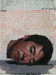 an image of a man with his head down on the ground in front of a piece of paper