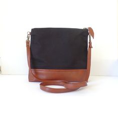 Leather crossbody purse, Vegan leather and cotton crossbody bag, Everyday casual crossbody purse, Caramel brown and black crossbody bag Black Crossbody Bag With Leather Strap, Brown Coated Canvas Crossbody Bag, Versatile Brown Crossbody Bag Strap, Black Leather-lined Crossbody Bag, Small Black Crossbody Bag, Brown Leather-lined Crossbody Clutch, Vegan Leather Tote Bag, Large Leather Tote Bag, Vegan Leather Tote