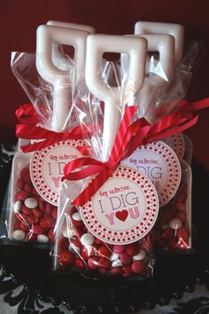 valentine's day treats in plastic bags with red ribbons