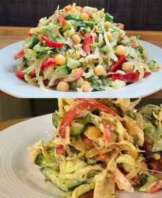 two plates filled with different types of salads on top of each other and one has a fork in it