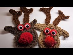 two crocheted reindeer hats with googly eyes