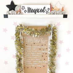 a bulletin board is decorated with garland and stars