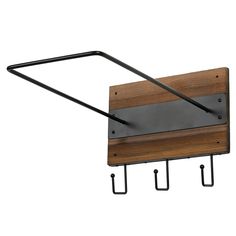 a wooden and metal shelf with hooks on it