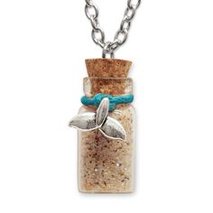 a bottle with a fish charm on it and a blue ribbon around the neck that is attached to a chain