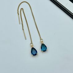 Dainty Blue Thread Teardrop Earrings, Dark Blue Gold Earrings, Statement Blue Drop Earrings, Long Blue Dangle Earrings, Thread Earrings. These are simple and beautiful blue teardrop crystal earrings. Blue crystals are framed in bright gold and dangling from long thread. Measurements: The total length from the top of the hook to bottom - 3.74 inches (95 mm) approximately. Crystals: 10 mm x 6 mm The earrings would be a PERFECT GIFT for you and your family and friends! Click here to see more Modern Cheap Blue Long Drop Earrings, Luxury Blue Linear Drop Earrings, Blue Teardrop Earrings For Gift, Blue Long Drop Teardrop Earrings Gift, Blue Long Drop Earrings For Gifts, Blue Dangle Teardrop Earrings For Pierced Ears, Blue Drop Earrings With Ear Wire, Blue Teardrop Earrings Gift, Blue Long Drop Teardrop Earrings For Pierced Ears