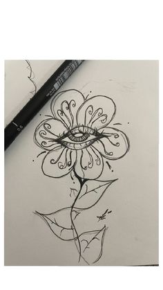 a drawing of a flower with an eye on it