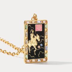 Welcome to the luxurious world of Death Tarot Card Necklaces. Crafted with immaculate attention to detail, these beautiful necklaces feature an intricately-designed Tarot Card of Death in brass endings, bringing a touch of sophistication and timelessness to any look. Experience an exquisite blend of style and artistry with this elegant necklace. DETAILS Plating: 18K Gold Materials: 18K Gold on Brass, Cubic Zirconia Measurements: Length: 19.69"(50cm) + Pendant: 1.57"(4.0cm) Pendant Size: length:1 Tarot Card Necklace, Diamond Star Necklace, Star And Moon Necklace, Card Necklace, Diamond Evil Eye, Talisman Necklace, Unique Gift Wrapping, Lucky Bracelet, Evil Eye Earrings