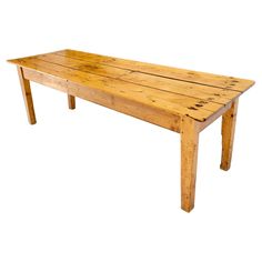 a wooden table sitting on top of a white background