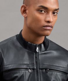 Soft leather biker jacket with an informal look that becomes better with time. A minimalist and modern take on a menswear icon. Fine materials and meticulous attention to detail give it a tailored look and slim fit. Zipped high pockets, side welt pockets. Central double-slider zip, stand up collar, and knitted cuffs. A timeless, evergreen classic. Soft leatherFull-length central zipHigh and side pocketsStand-up collarKnitted cuffs and waist Winter Trench Coat, Side Bag, Standing Collar, Stand Up Collar, Jacket Parka, Outerwear Outfit, Sleeveless Jacket, Leather Biker Jacket, Lightweight Jacket