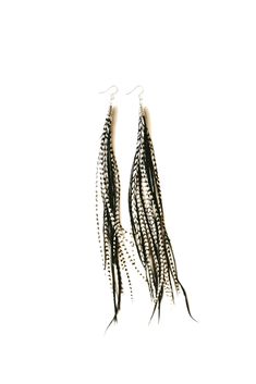 PRICES MAY VARY. Luxurious long natural rooster feathers in color (Black and Grizzly) Average drop length 7 -10 inches long from hook to tip (Length will vary slightly from pair to pair.) .925 sterling silver hypo allergenic earring hooks Ultra lightweight at only about 0.5 grams each (less than a US dime) Makes an excellent gift for any occasion! Handmade just for you Make a statement with these simple unique handmade striking long thin rooster feather earrings. They are 7"- 10" long, lightweig Feathered Earrings, Deer Antler Jewelry, Antler Jewelry, Rooster Feathers, Festival Earrings, Bohemian Handmade, Earring Hooks, Feather Earrings, Dream Jewelry