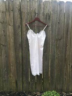 This is a great dress that is ready for a night out or a night in. If you want to look great, get this in your life now. It has a small snag at the bottom, pictured, but is still awesome. There are no rips, holes, stains or smells. Measurements: laying flat and doubled Bust: 32 inches Waist: 27 inches Hips: 38 inches Length: 37 inches Size on tag: 34 (seems like a medium in the waist with a C cup top) C Cup, Lingerie Dress, Night In, Columbus, Basic Tank Top, Lace Trim, Looks Great, Night Out, That Look