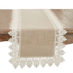 a table runner with white lace on it