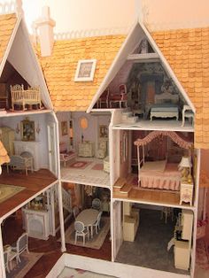 a doll house with all the furniture in it