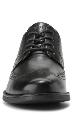 A classic wingtip toe details a sophisticated leather derby grounded by a foam-cushioned footbed and lightweight sole for optimal comfort. Leather upper/textile lining/rubber sole Imported Classic Low-top Synthetic Dress Shoes, Classic Synthetic Lace-up Shoes For Formal Events, Classic Formal Lace-up Shoes In Synthetic, Synthetic Brogue Oxfords With Plain Toe, Classic Synthetic Wingtip Oxfords, Synthetic Oxfords With Brogue Detailing, Synthetic Plain Toe Oxfords With Brogue Detailing, Formal Synthetic Wingtip Oxfords, Synthetic Wingtip Dress Shoes For Formal Occasions