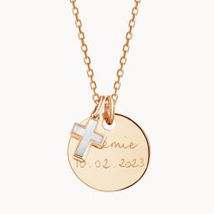 The perfect personalized necklace to celebrate a christening or communion. Cherish special memories with our Personalized Mother of Pearl Cross Necklace. Hand-engrave precious dates or names onto the front and reverse of your preferred disc and pair with an elegant mother-of-pearl cross charm. 18K Champagne Gold Plated or 925 Sterling SilverSmall Flat Disc: 0.6 x 0.6Medium Flat Disc:  0.7 x 0.7Mother of Pearl Cross: 0.4 x 0.3Charms are removable from this chain and can be worn on all Merci Maman Personalized Yellow Gold Necklaces For First Communion, Personalized Yellow Gold Necklace For First Communion, Elegant Personalized Necklace For First Communion, Elegant Personalized Necklace For Baptism, Engraved Cross Pendant Necklace For Baptism, Pearl Cross Necklace, Cross Chain, Cross Charms, Champagne Gold