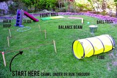 an inflatable barrel is set up on the grass to play with hoop tossers