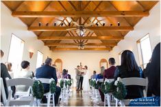 a couple getting married at the end of their wedding ceremony