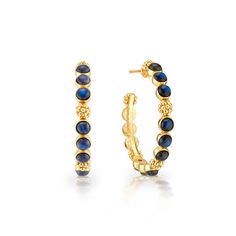 Classic hoop earrings are adorned with lustrous clusters of cabochon gems and a sprinkling of golden berries for a look that is polished and feminine. These hoops add a fabulously feminine flourish to any ensemble—whether you’re running a meeting, hosting a dinner party or jet-setting to Monaco. Elegant Hoop Jewelry With Gemstone Accents, Gold Elegant Hoop Earrings With Gemstone Accents, Elegant Gold Hoop Earrings With Gemstone Accents, Elegant Gold Hoop Earrings With Natural Stones, Elegant Round Hoop Earrings With Gemstone Accents, Golden Berries, Bridal Handbags, Medium Hoop Earrings, Labradorite Earrings