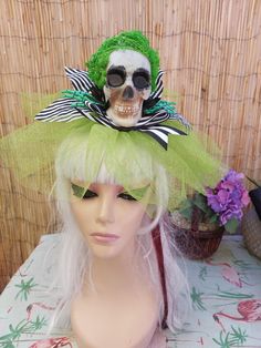 Very unique Beetlejuice inspired headpiece for the fans of the movie  Skull with green hair (moss) with real ostrich feathers, black white ribbon, glittery lime green tulle all around , holds with headband, very lightweight Skull Headdress, Black And White Ribbon, Mini Hat, Green Tulle, Costume Hats, Ostrich Feathers, White Ribbon, Beetlejuice, Green Hair