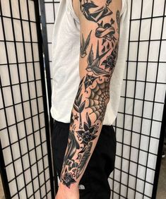 a man with a tattoo on his arm